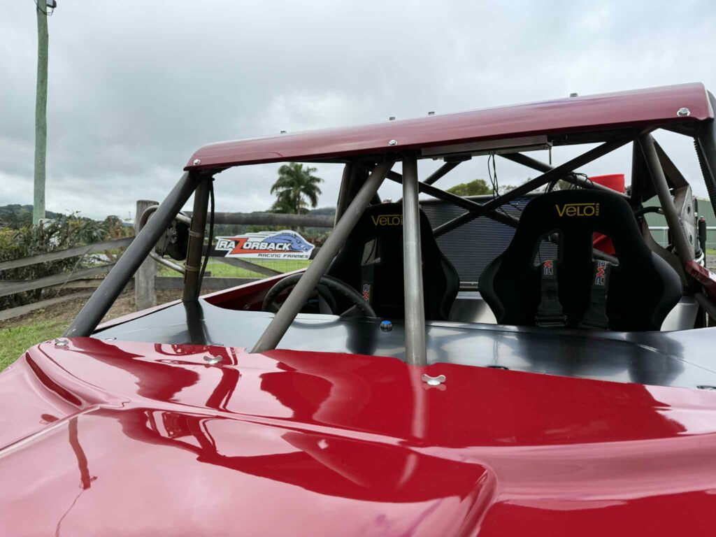 Razorback Mk1 cab with Velo seats and Razorback Racing Frames sign