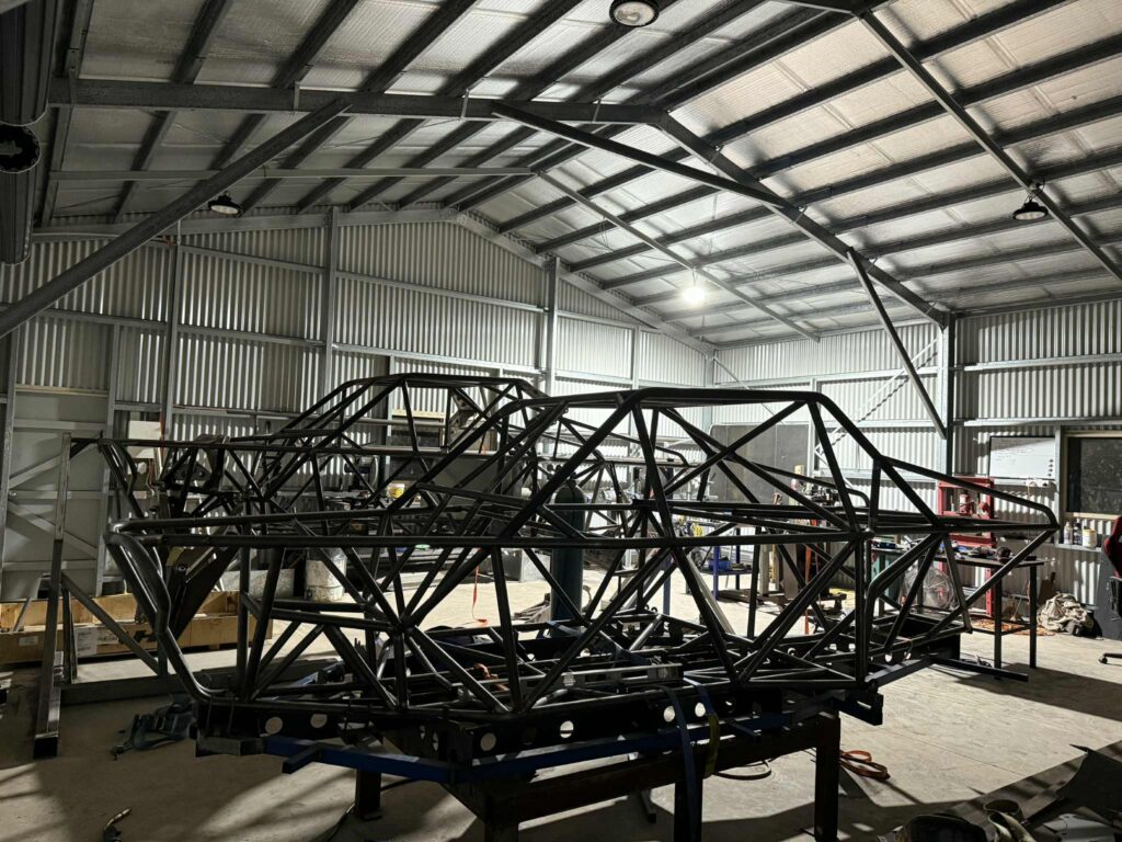Bare Razorback frame welded up in the jig